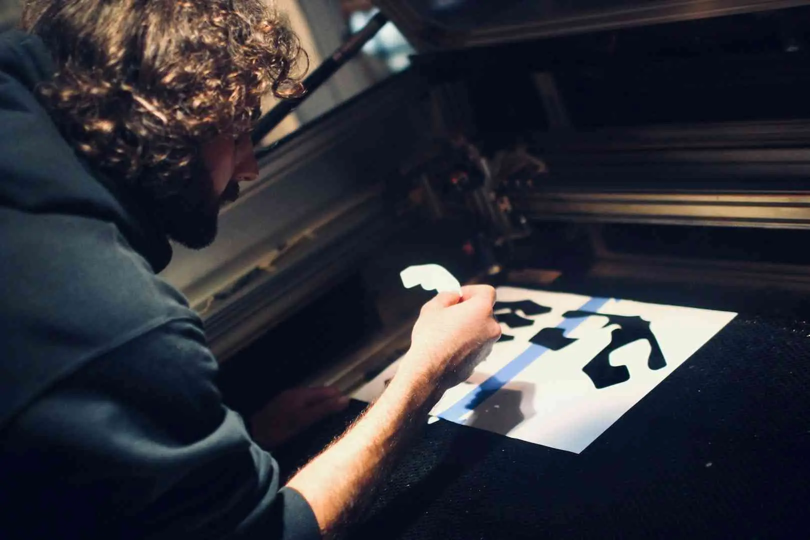 About us - Handmade design being cut with a laser cutter