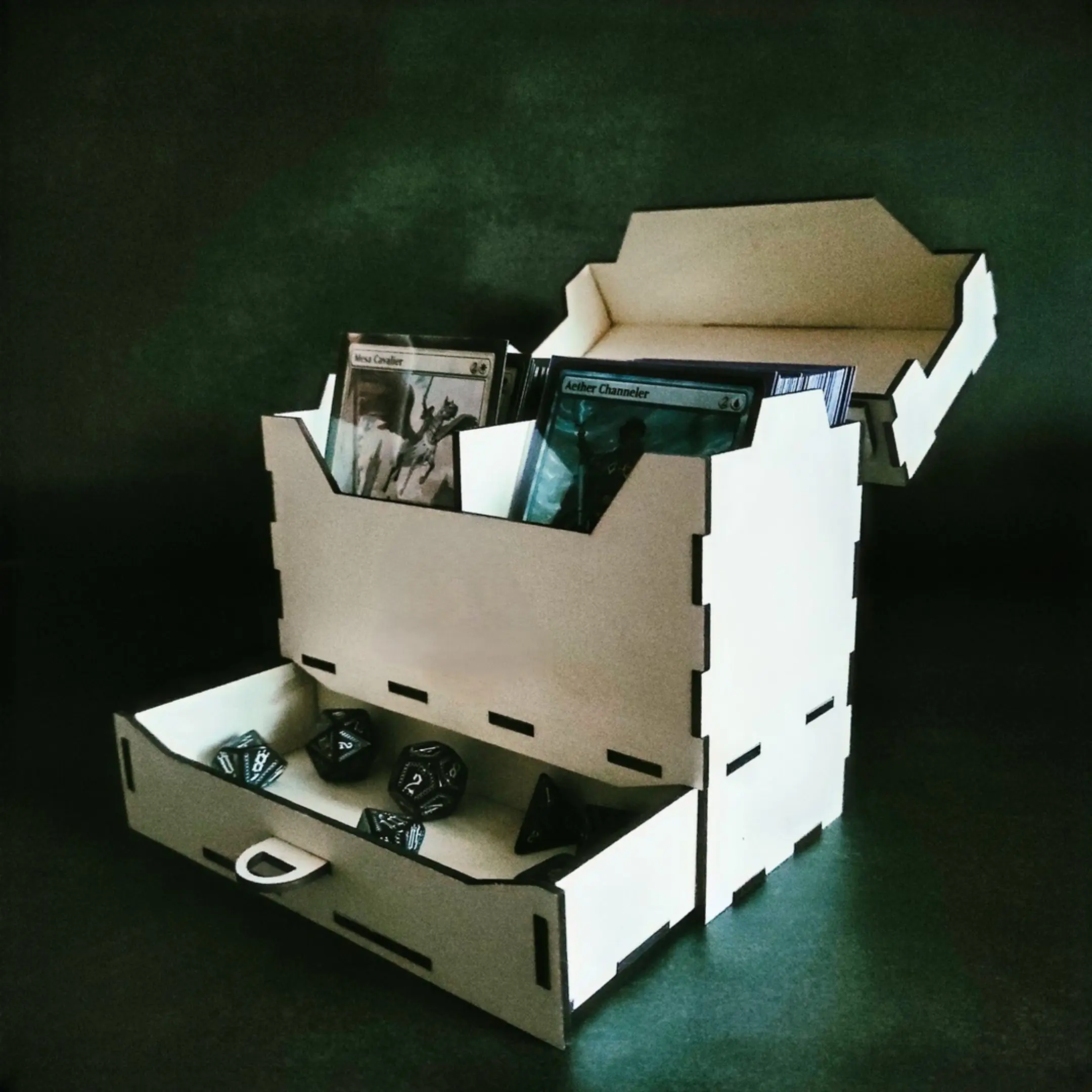 Open universal deck box for 200 sleeved cards with pulled-out dice drawer.