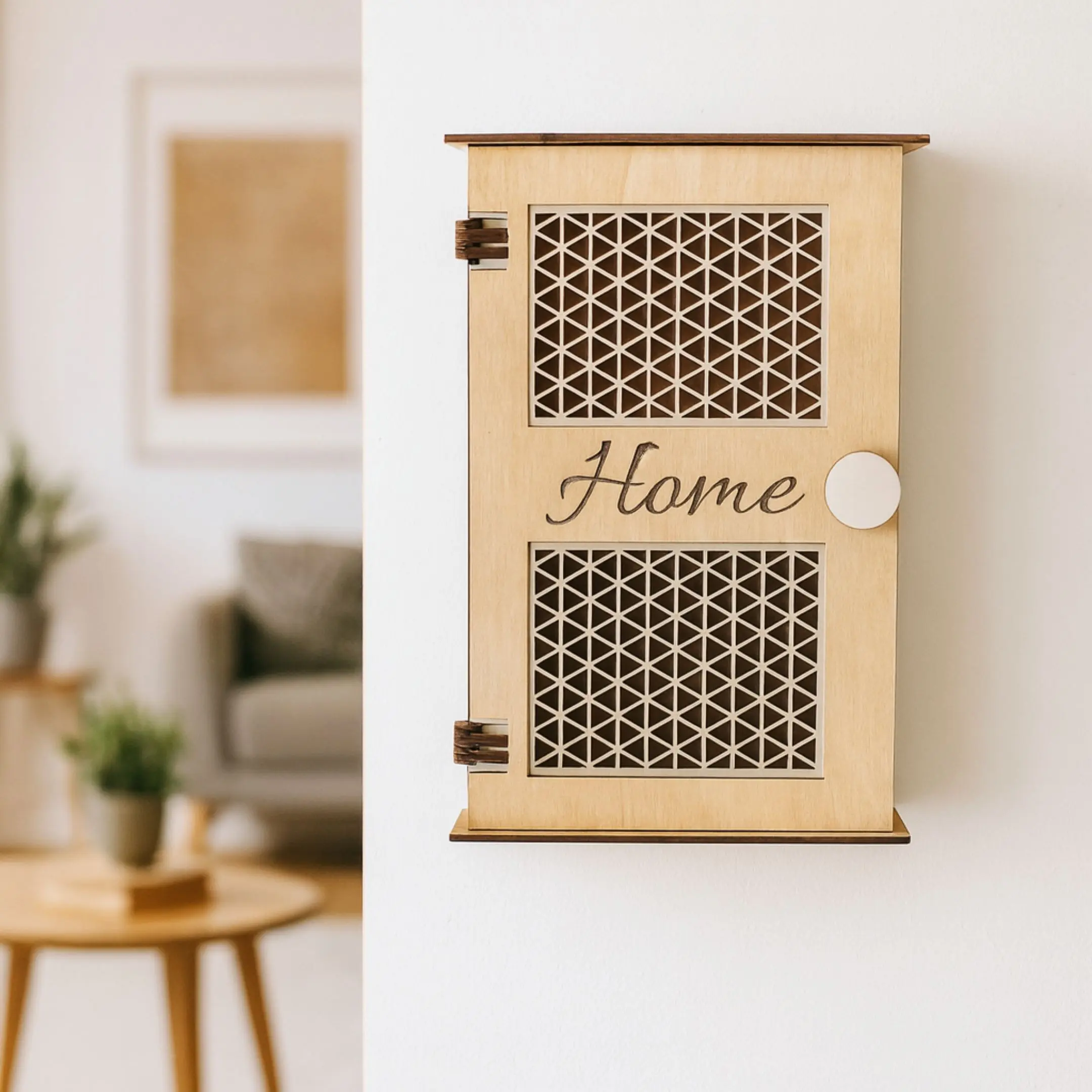 Laser cut home key cabinet hanging on a wall