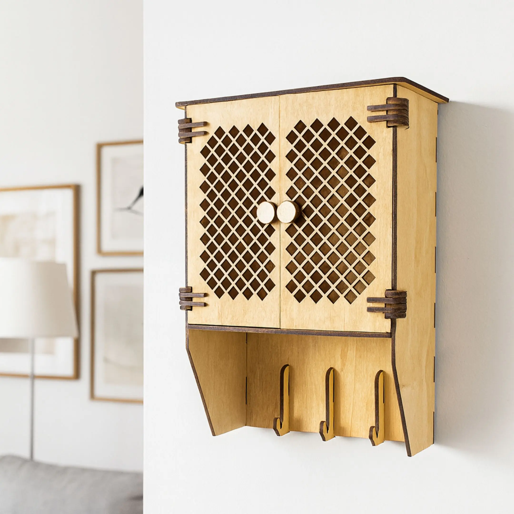 Laser Cut Rustic Key Cabinet hanging on a light-colored wall, showing its natural wooden finish and rustic charm.