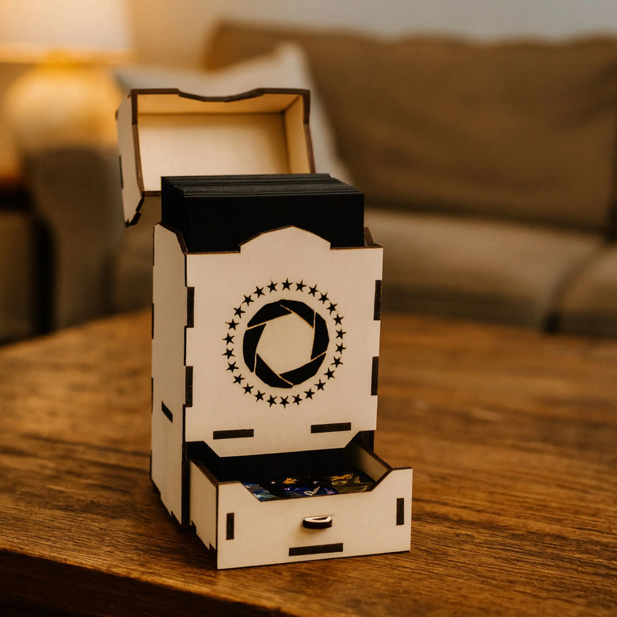 Laser-cut wooden Lorcana deck box on a table in a cozy room.