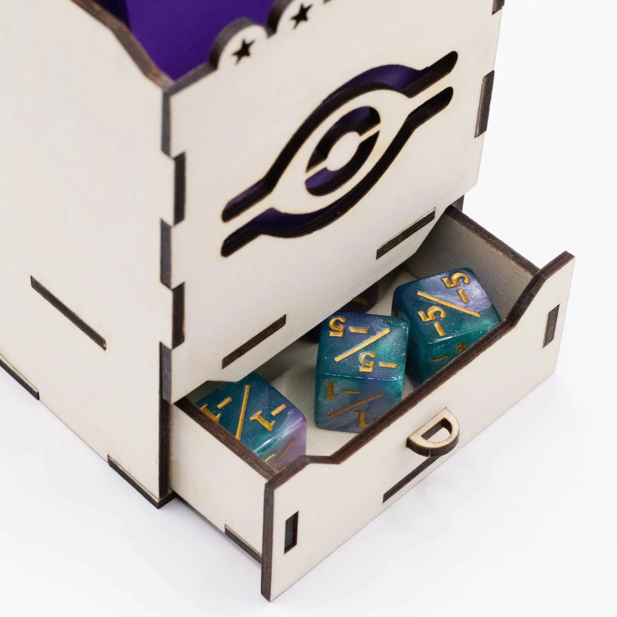 Close-up of the token and dice drawer in a Yu-Gi-Oh wooden deck box.