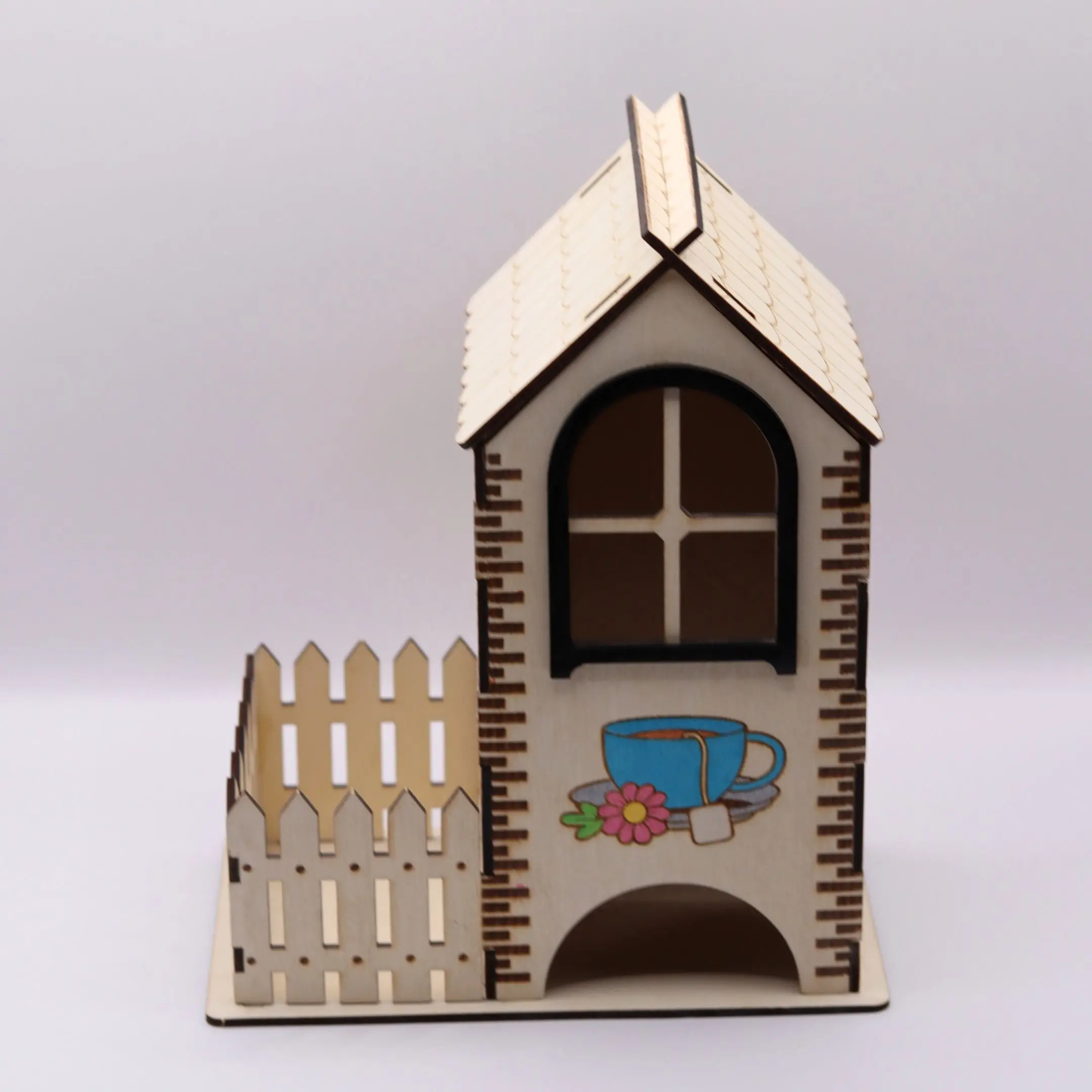 Laser cut tea house with lavender and fence – front view
