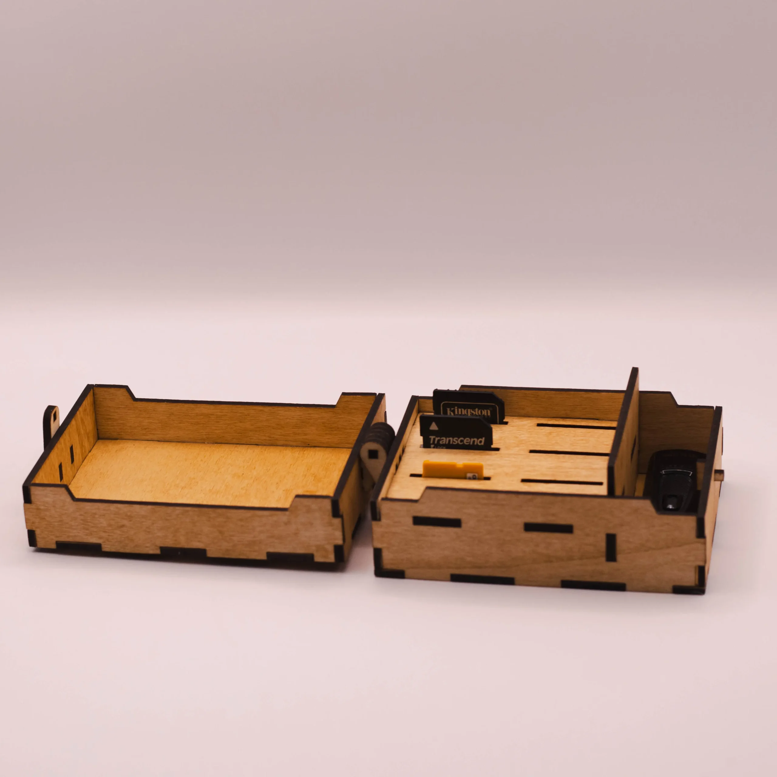 Wooden SD card holder filled with SD cards and USB stick inside