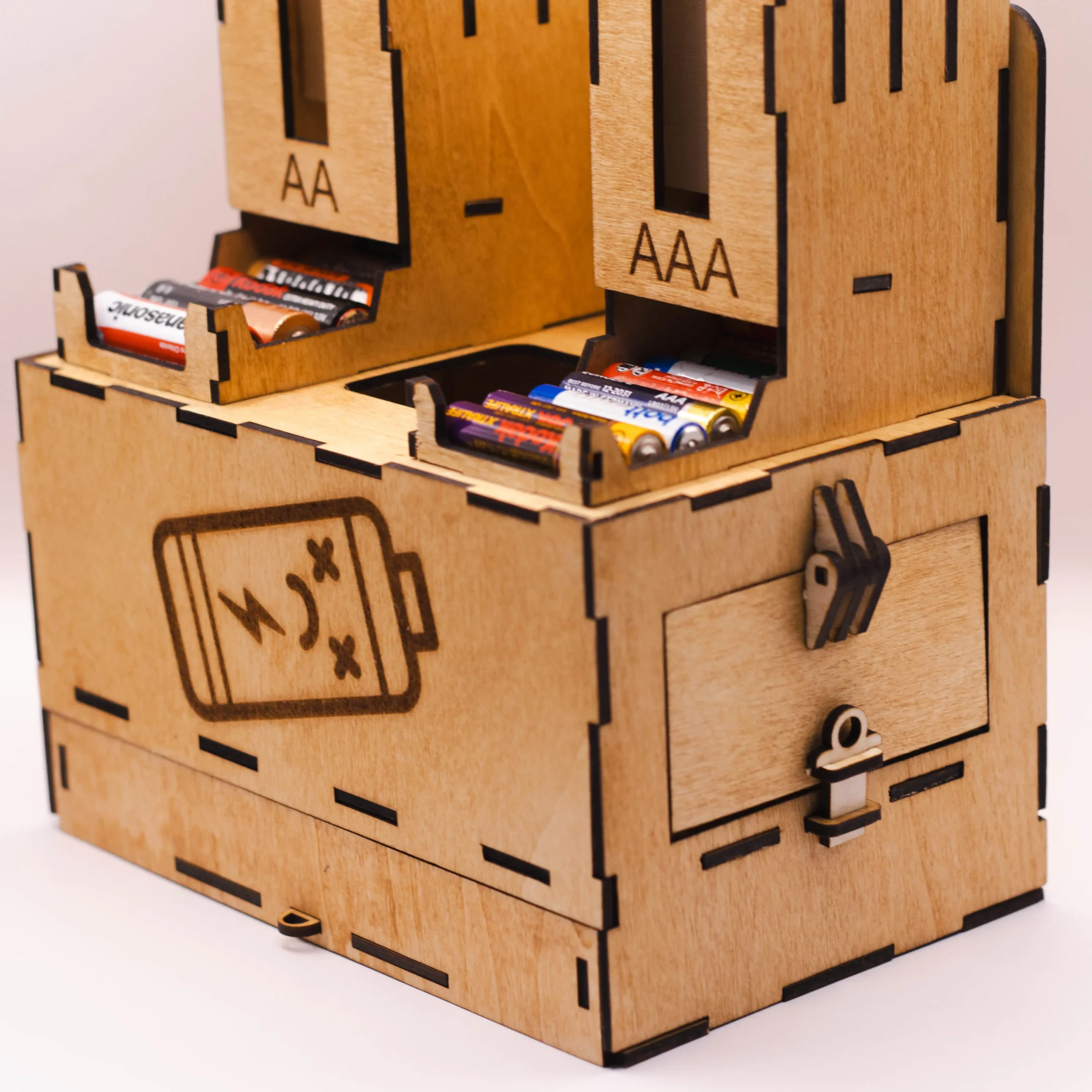 Side profile of a laser cut wooden battery organizer showing its compact, layered design