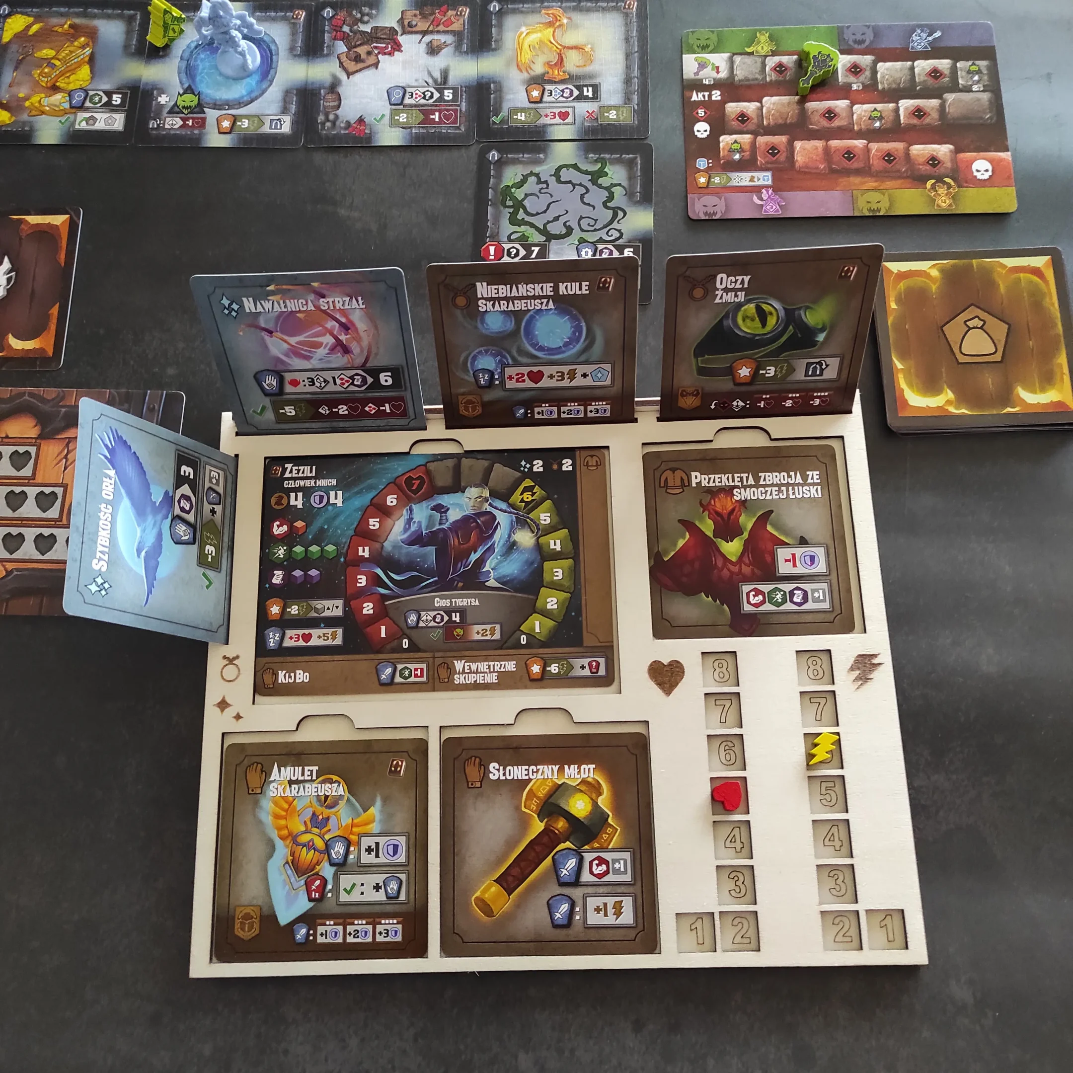 Laser cut Tiny Epic Dungeons player board with game components