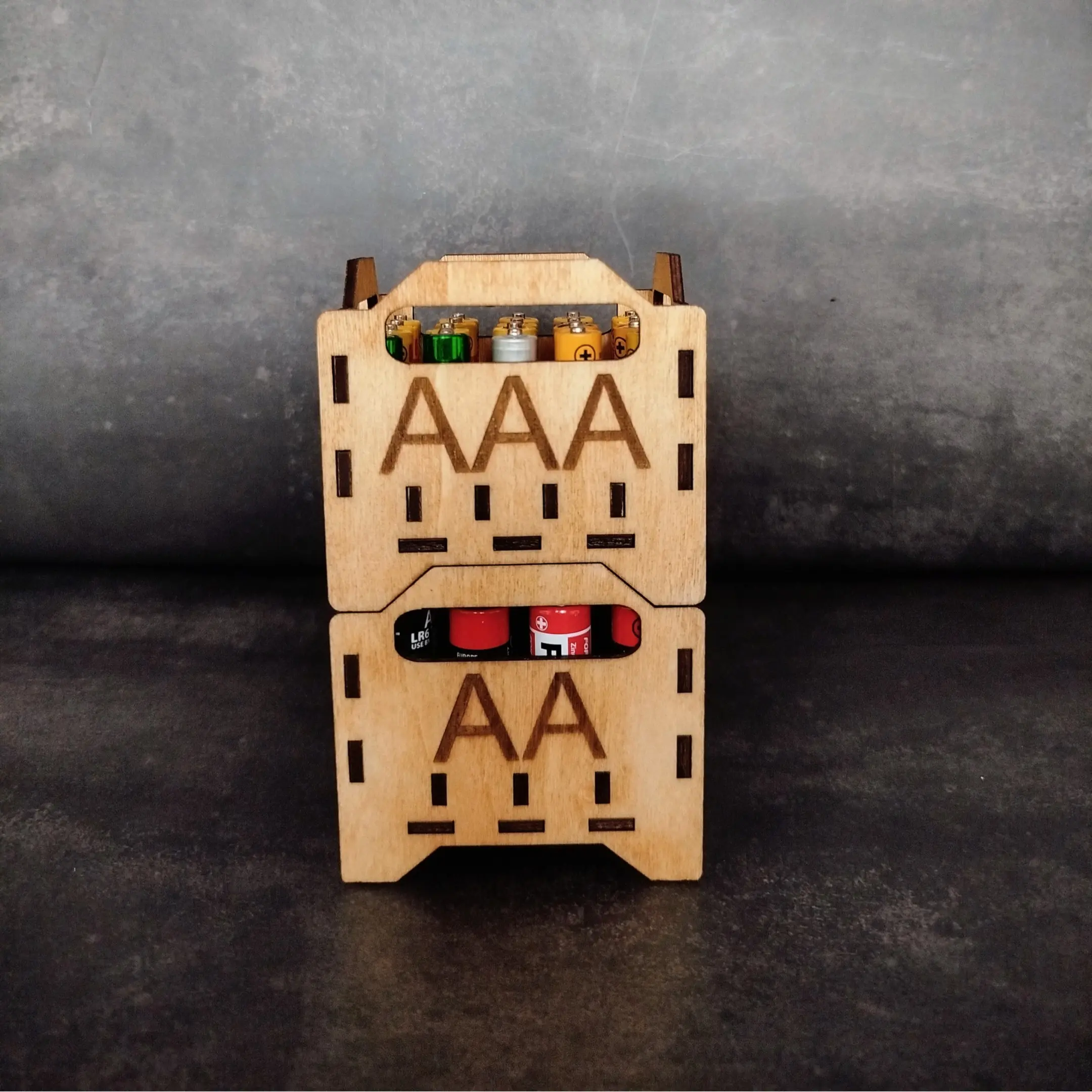Stackable laser cut battery crates for AA and AAA batteries