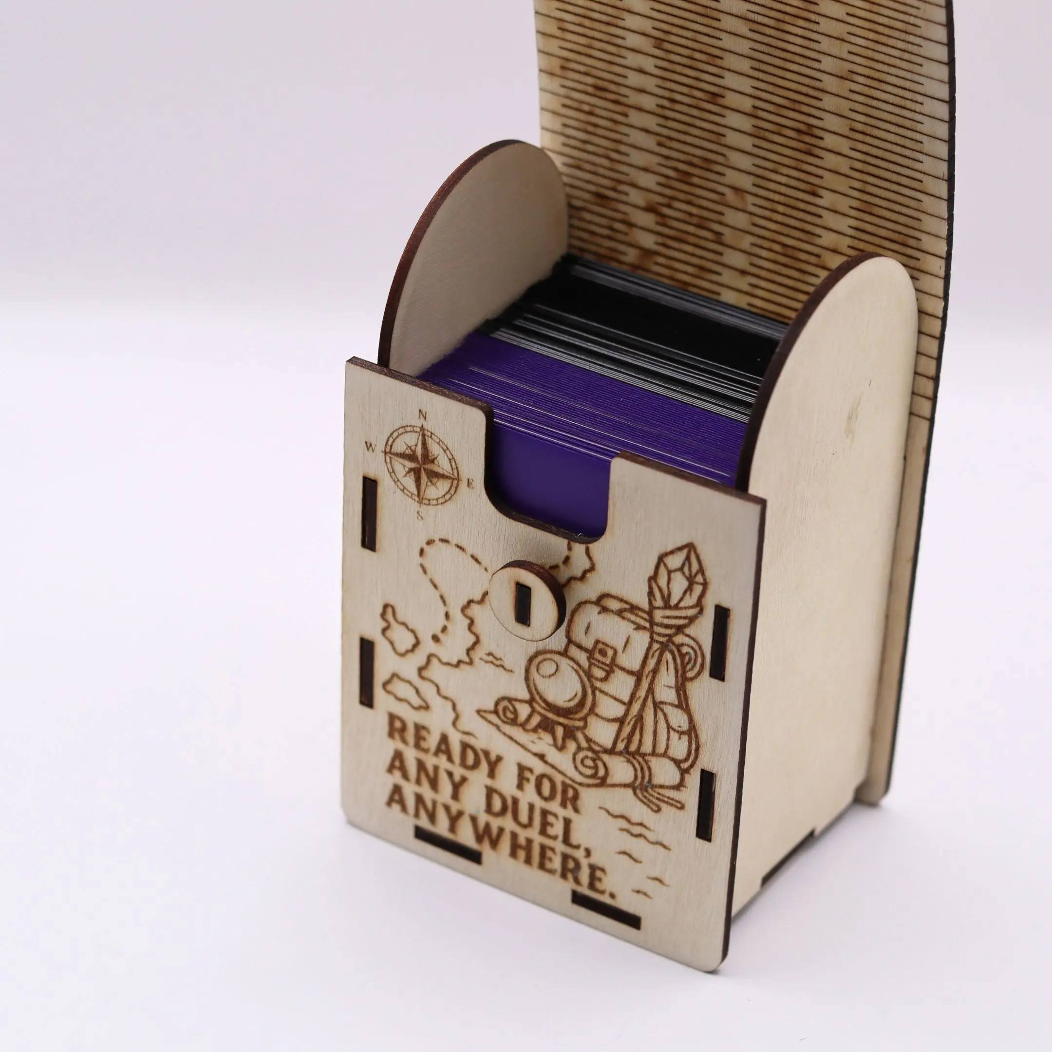 Close-up view of trading cards stored inside the TCG travel deck box for 100 cards.