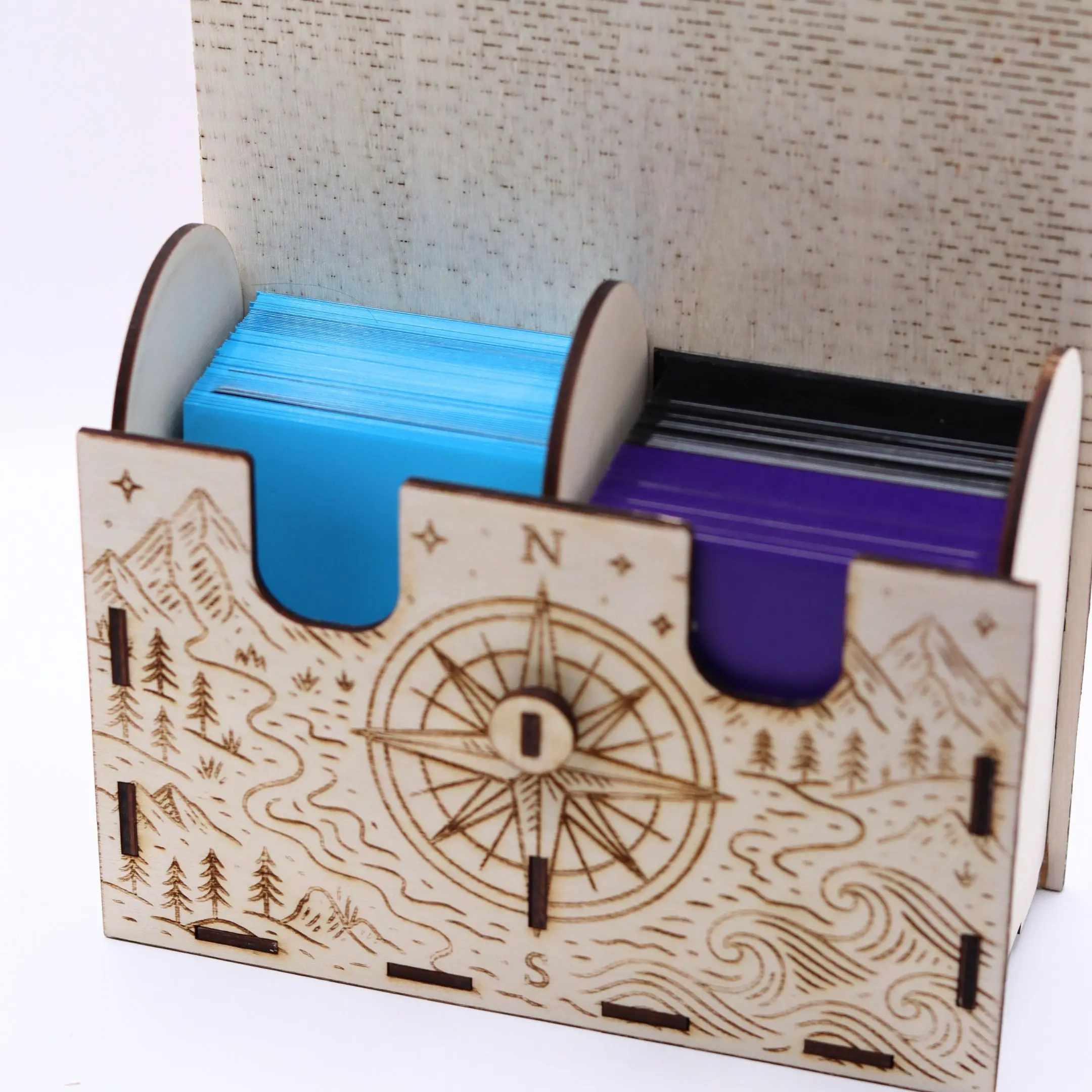Close-up view of trading cards stored inside the TCG travel deck box.